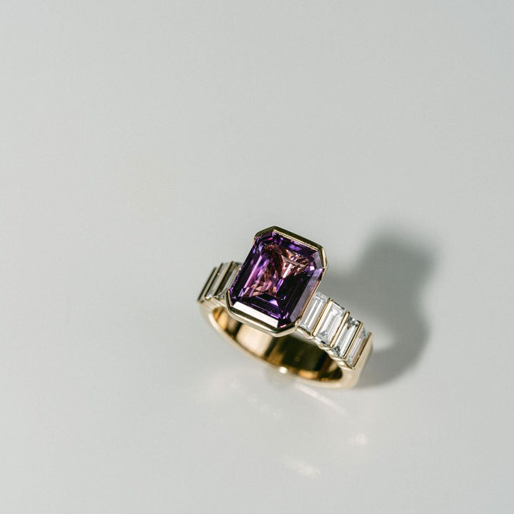 Emerald Cut Pink Sapphire Half Bezel With Bar Set Baguette Diamond Band