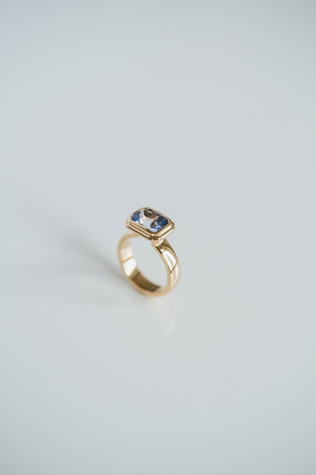 Emerald Cut Blue Sapphire Retro Bezel