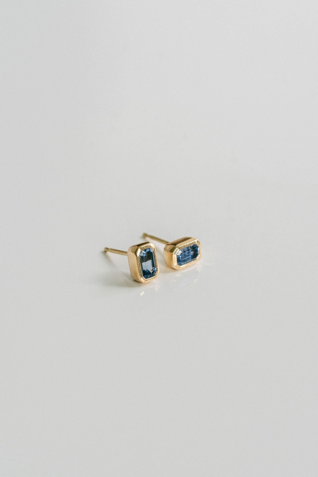 Emerald Cut Blue Sapphire Bezel Studs