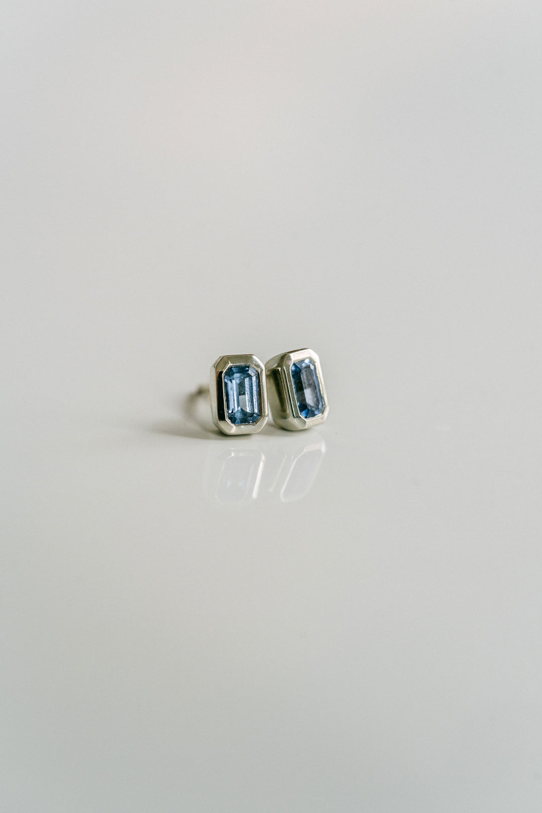 Emerald Cut Blue Sapphire Bezel Studs
