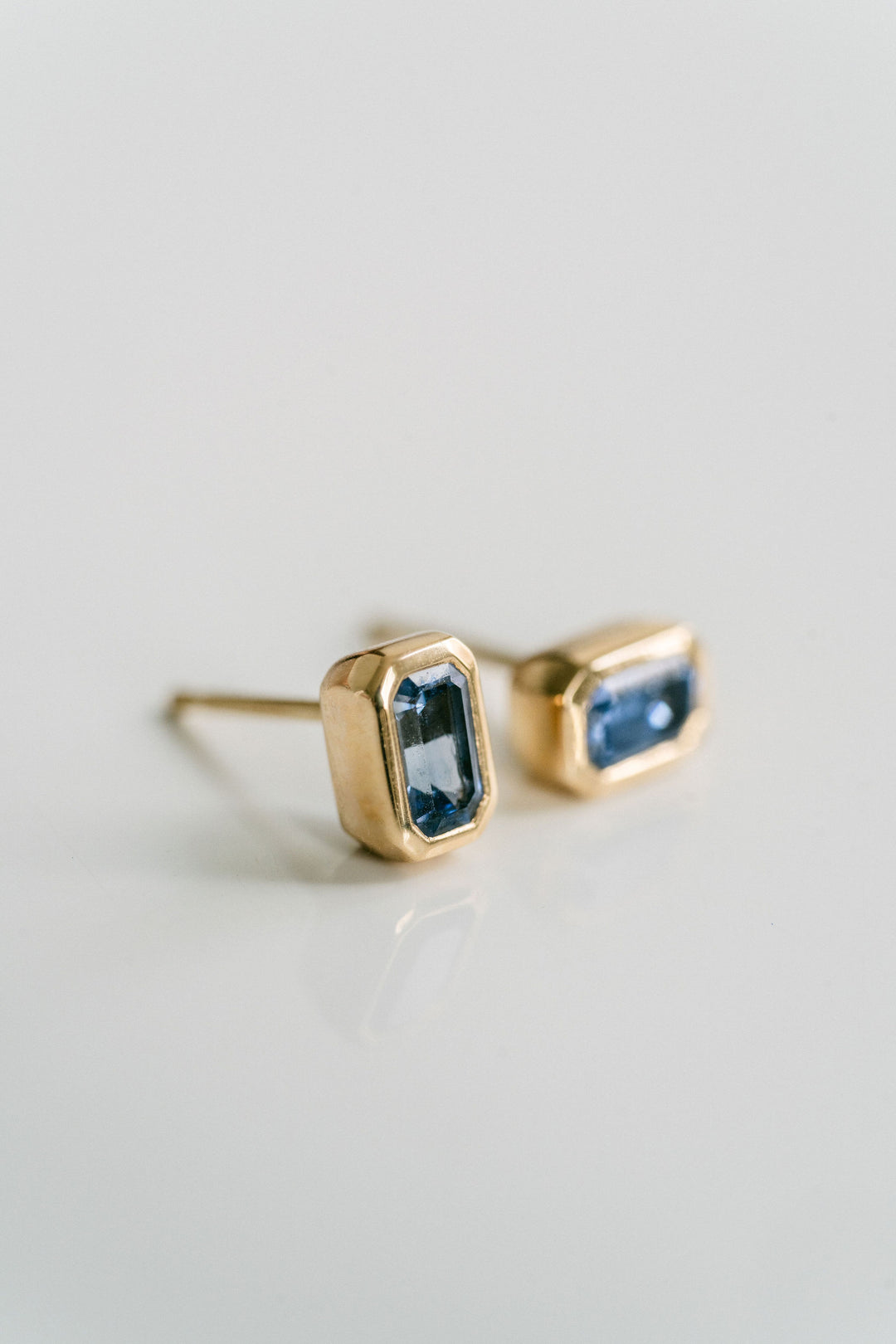 Emerald Cut Blue Sapphire Bezel Studs
