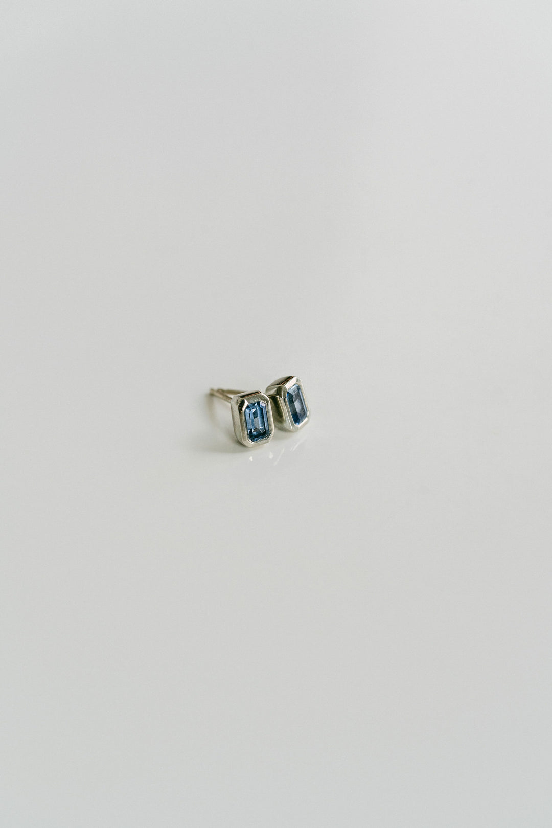 Emerald Cut Blue Sapphire Bezel Studs