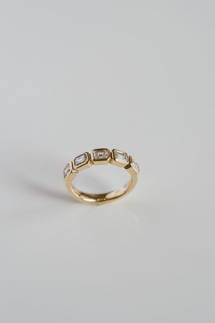 Emerald Cut Diamond East-West Bezel Band