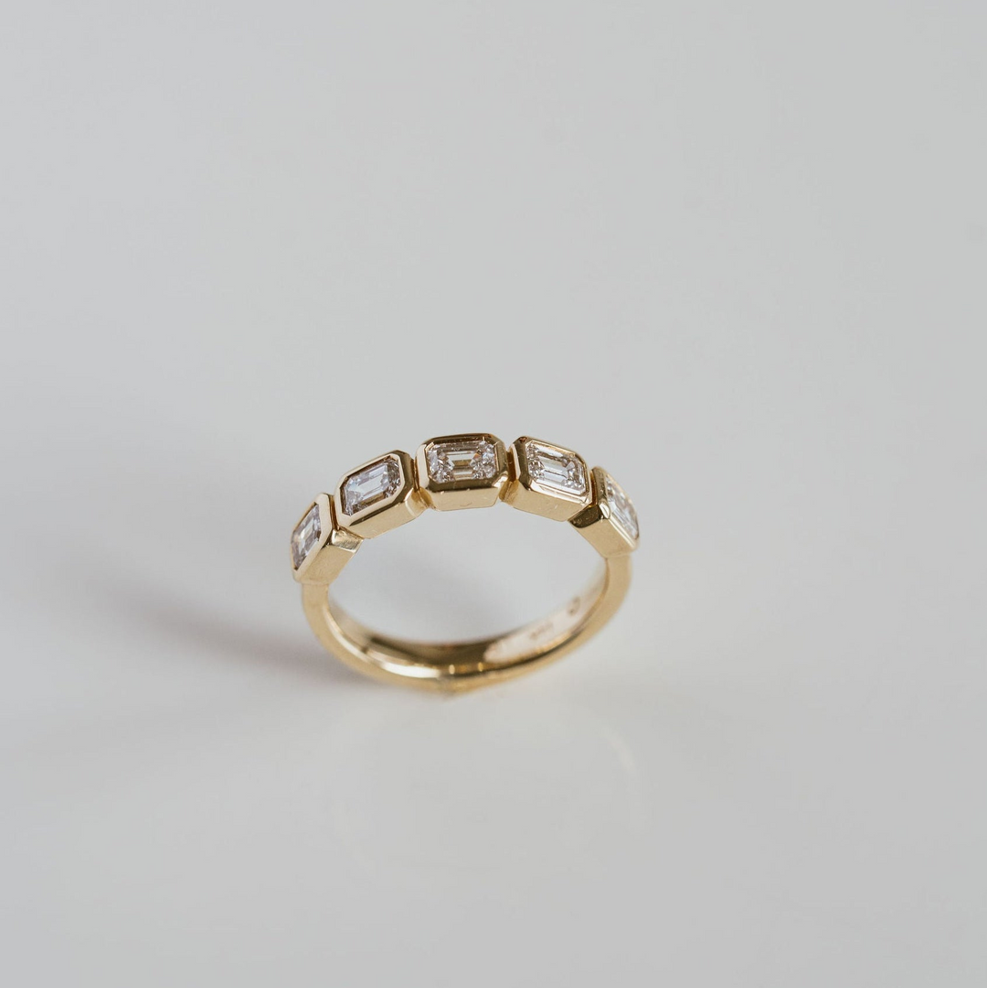 Emerald Cut Diamond East-West Bezel Band