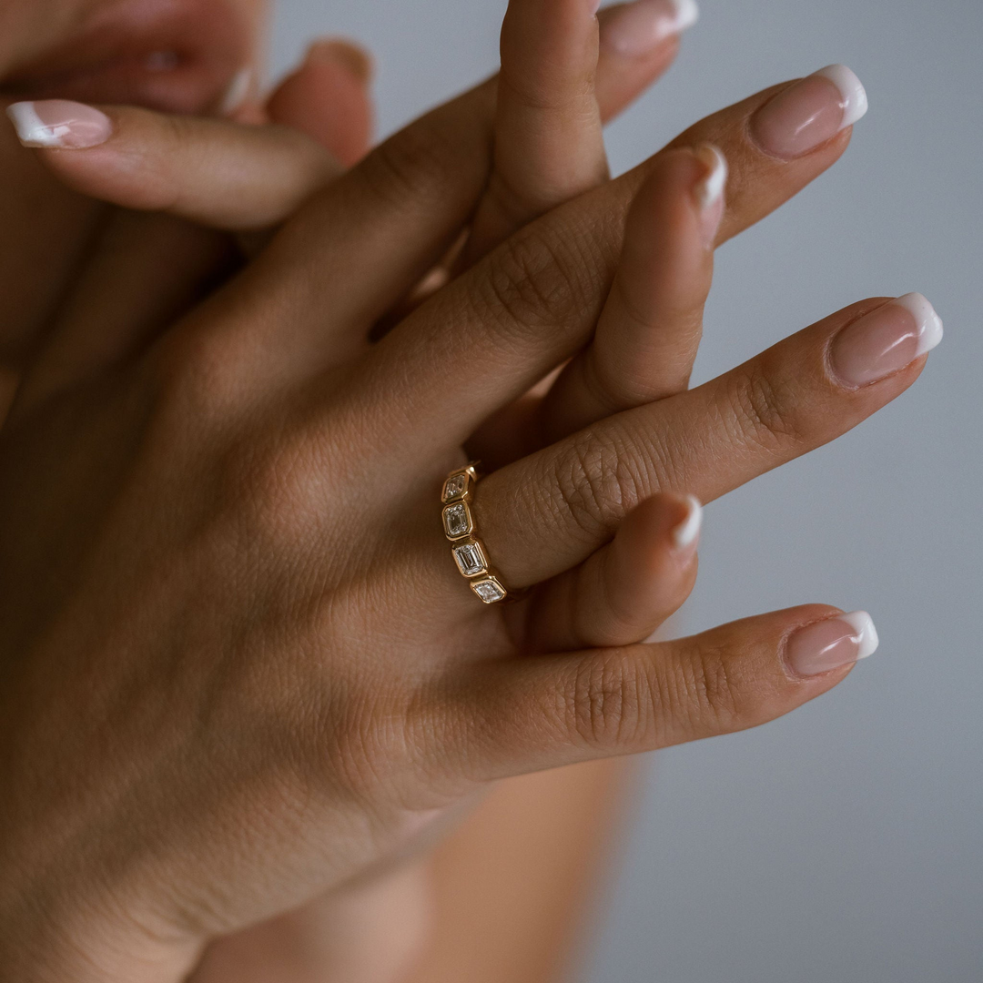 Emerald Cut Diamond East-West Bezel Band