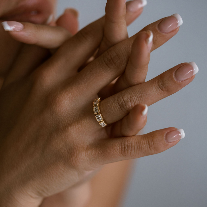 Emerald Cut Diamond East-West Bezel Band