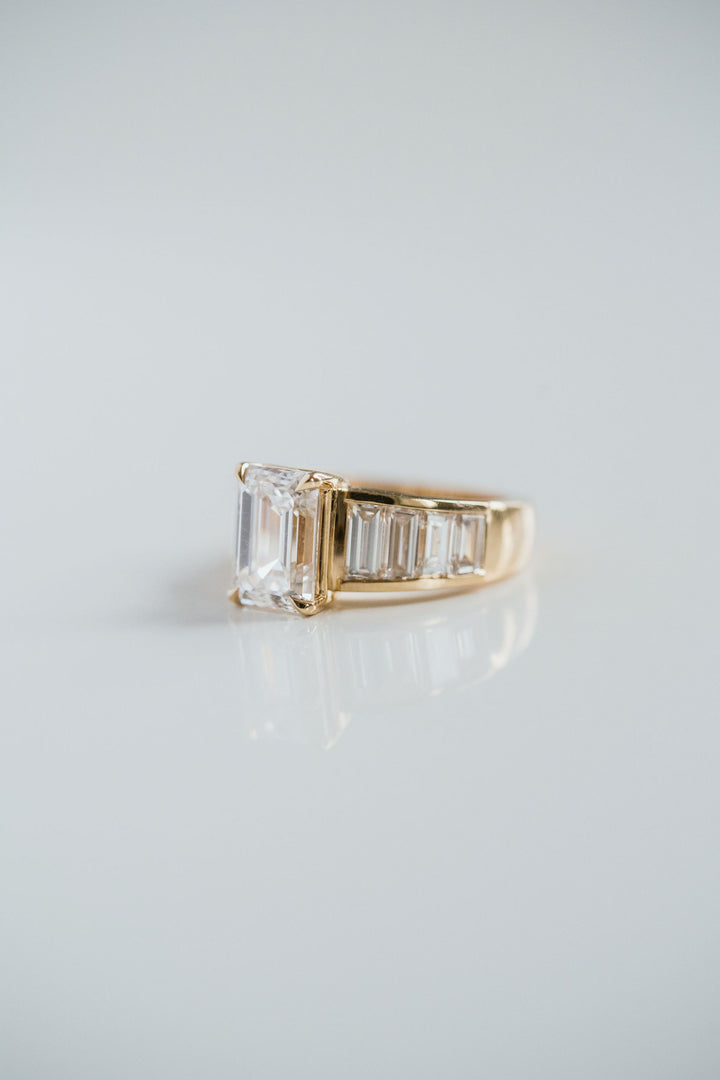 Emerald Cut Diamond With Graduated Baguette Channel Set Accents