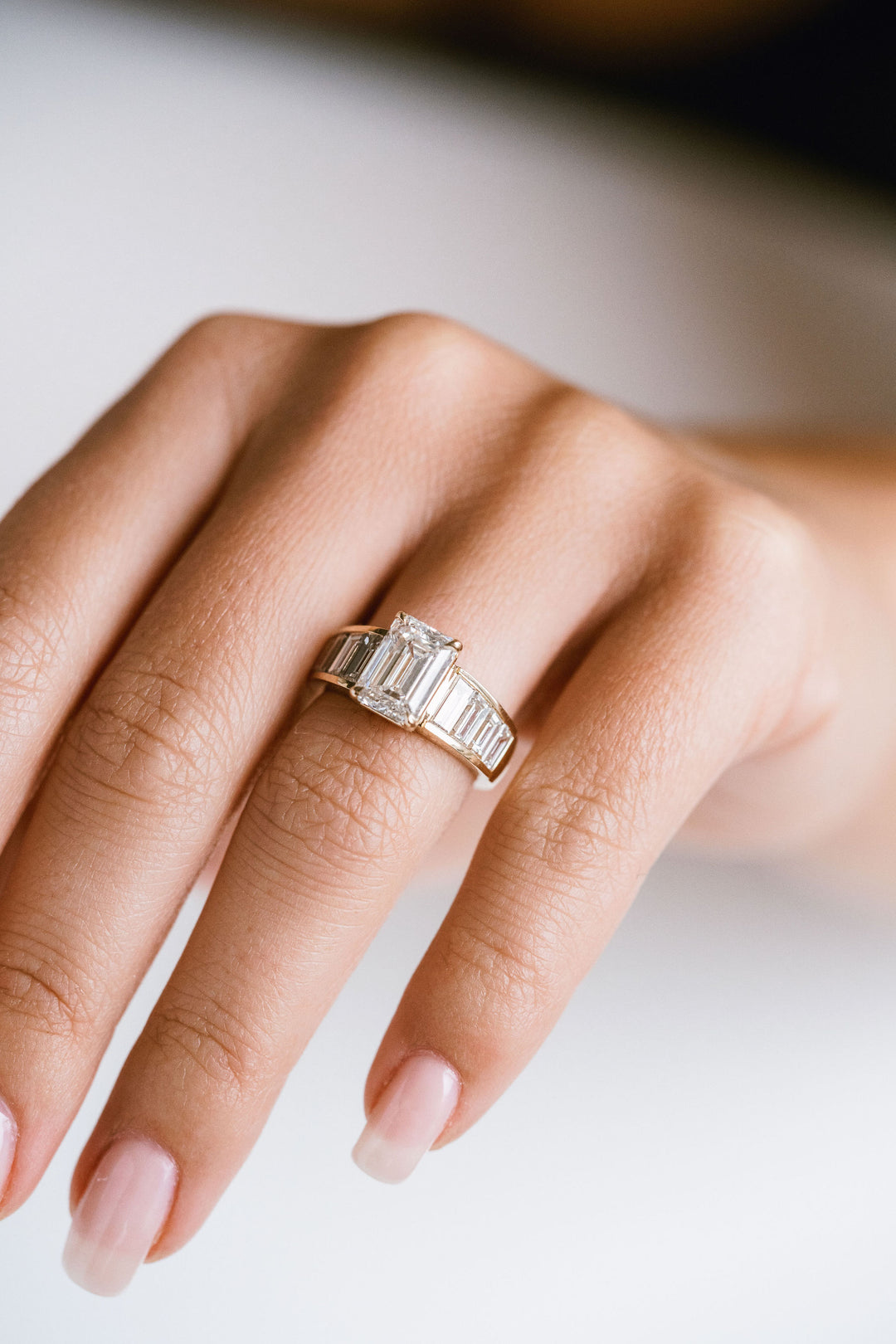 Emerald Cut Diamond With Graduated Baguette Channel Set Accents