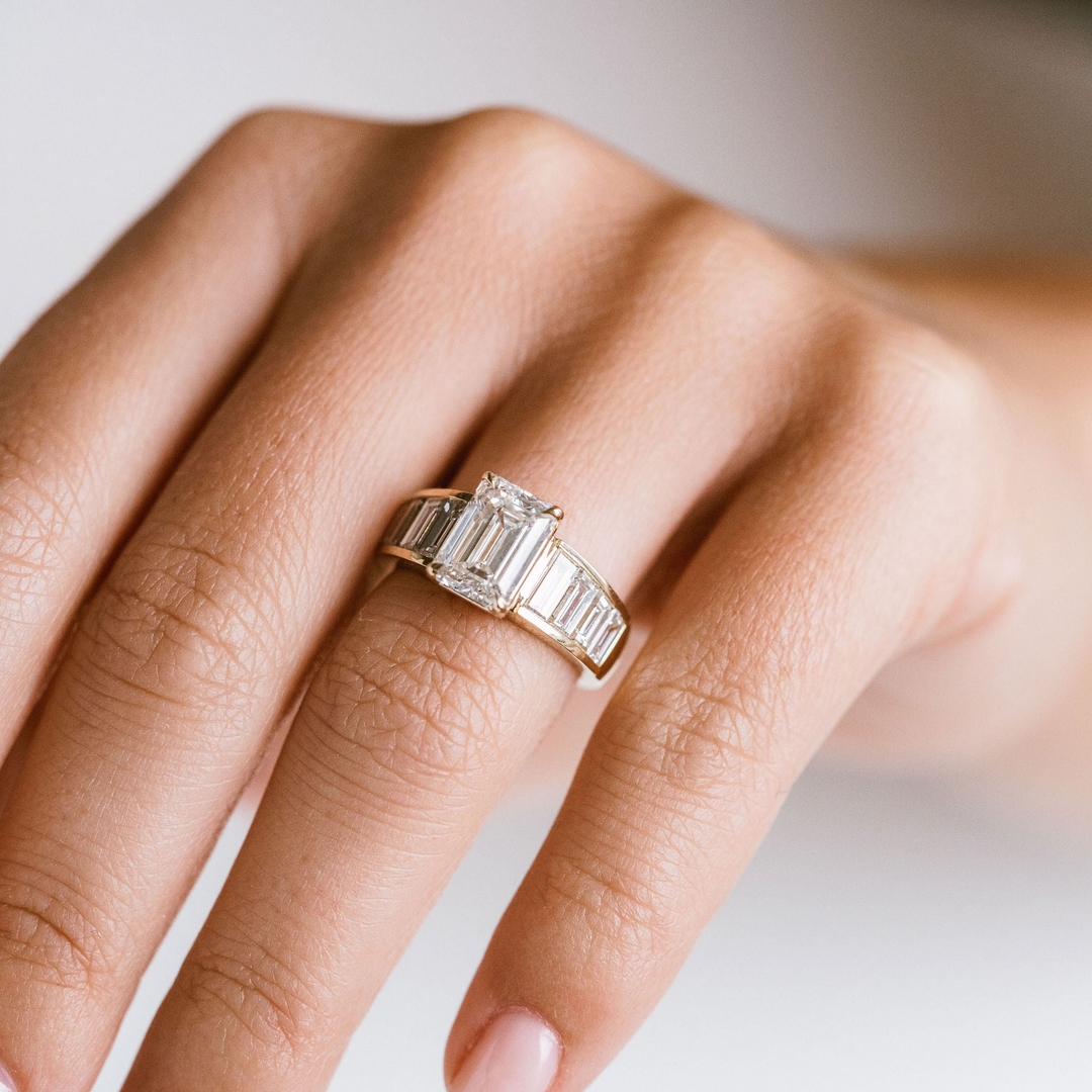 Emerald Cut Diamond With Graduated Baguette Channel Set Accents