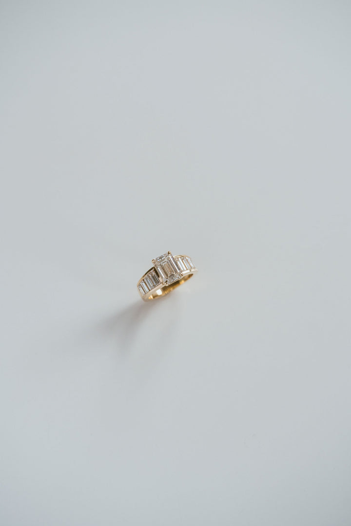 Emerald Cut Diamond With Graduated Baguette Channel Set Accents