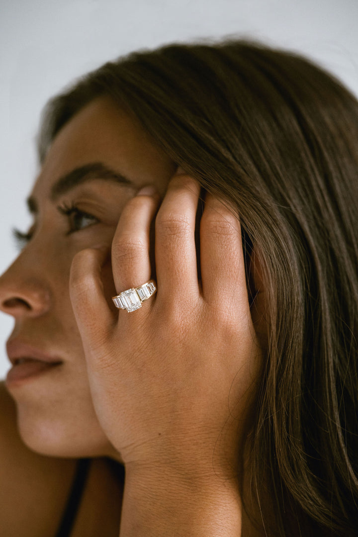 Emerald Cut Diamond With Graduated Baguette Channel Set Accents