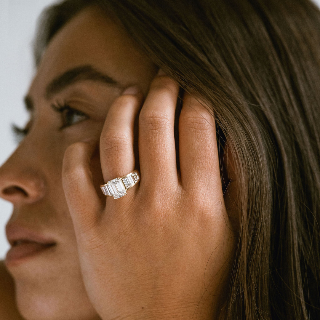 Emerald Cut Diamond With Graduated Baguette Channel Set Accents