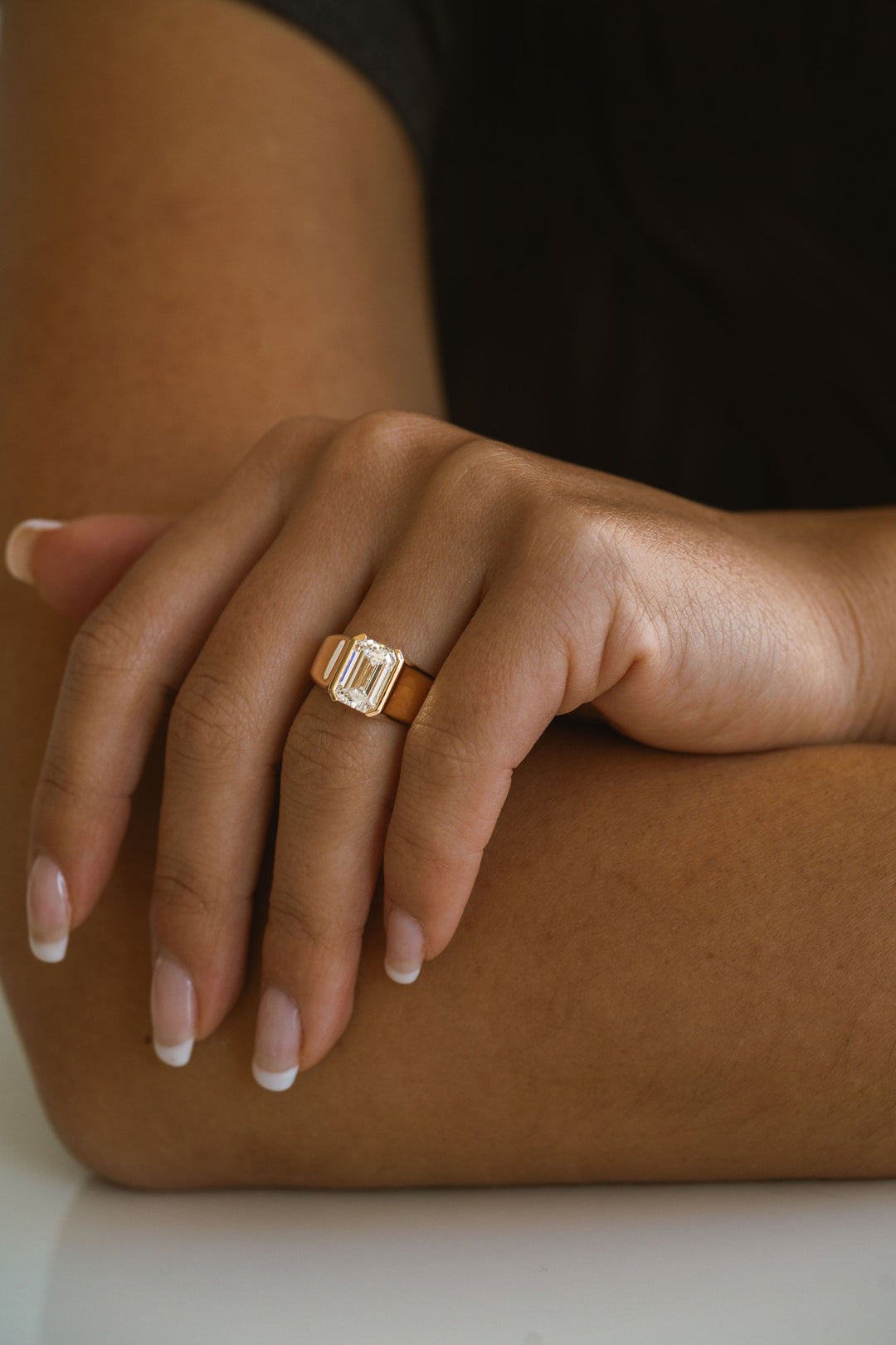 Emerald Cut Diamond Half Bezel Manor Ring