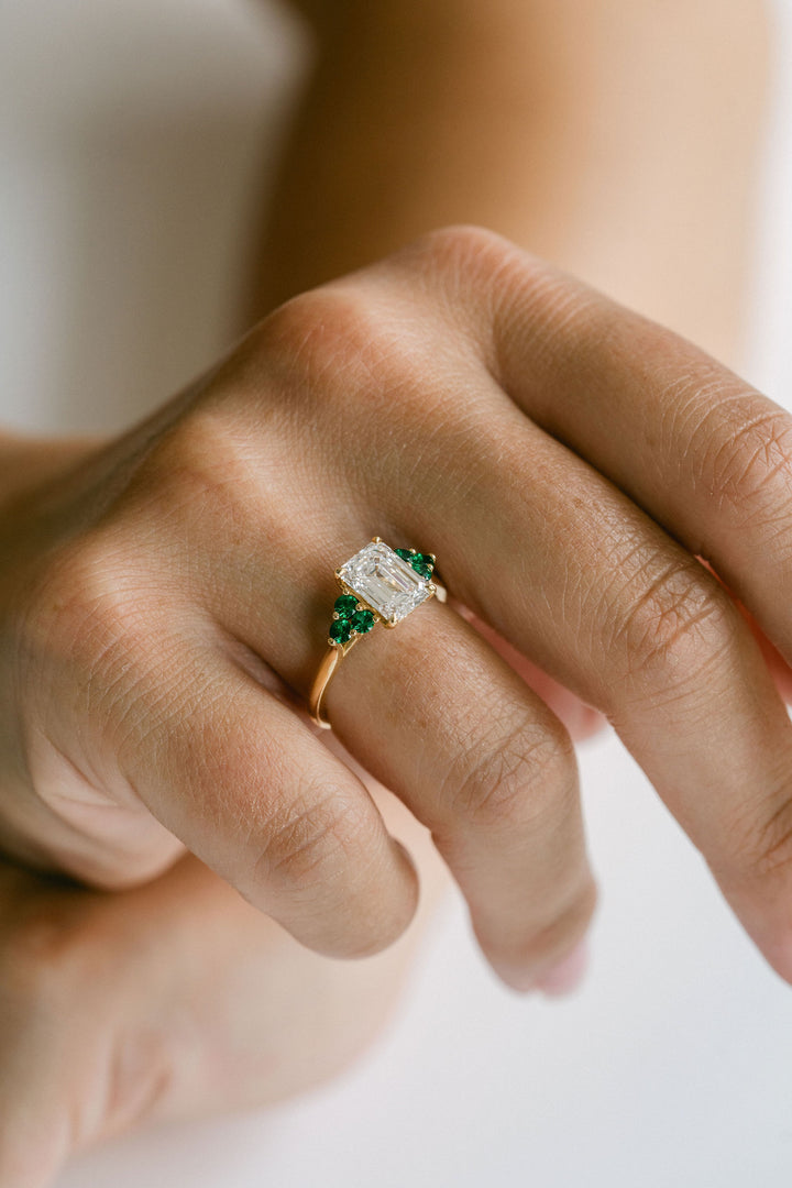 Emerald Cut Diamond With Emerald Cluster Accents