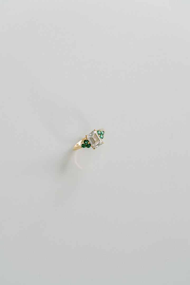 Emerald Cut Diamond With Emerald Cluster Accents