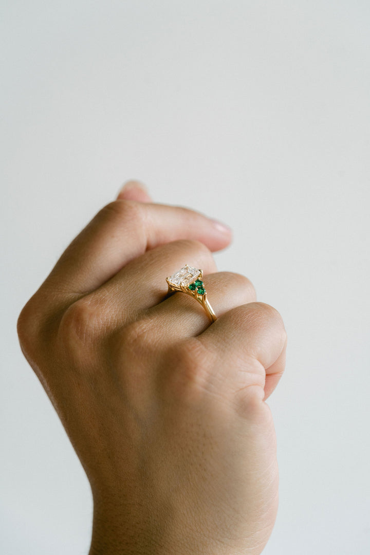 Emerald Cut Diamond With Emerald Cluster Accents
