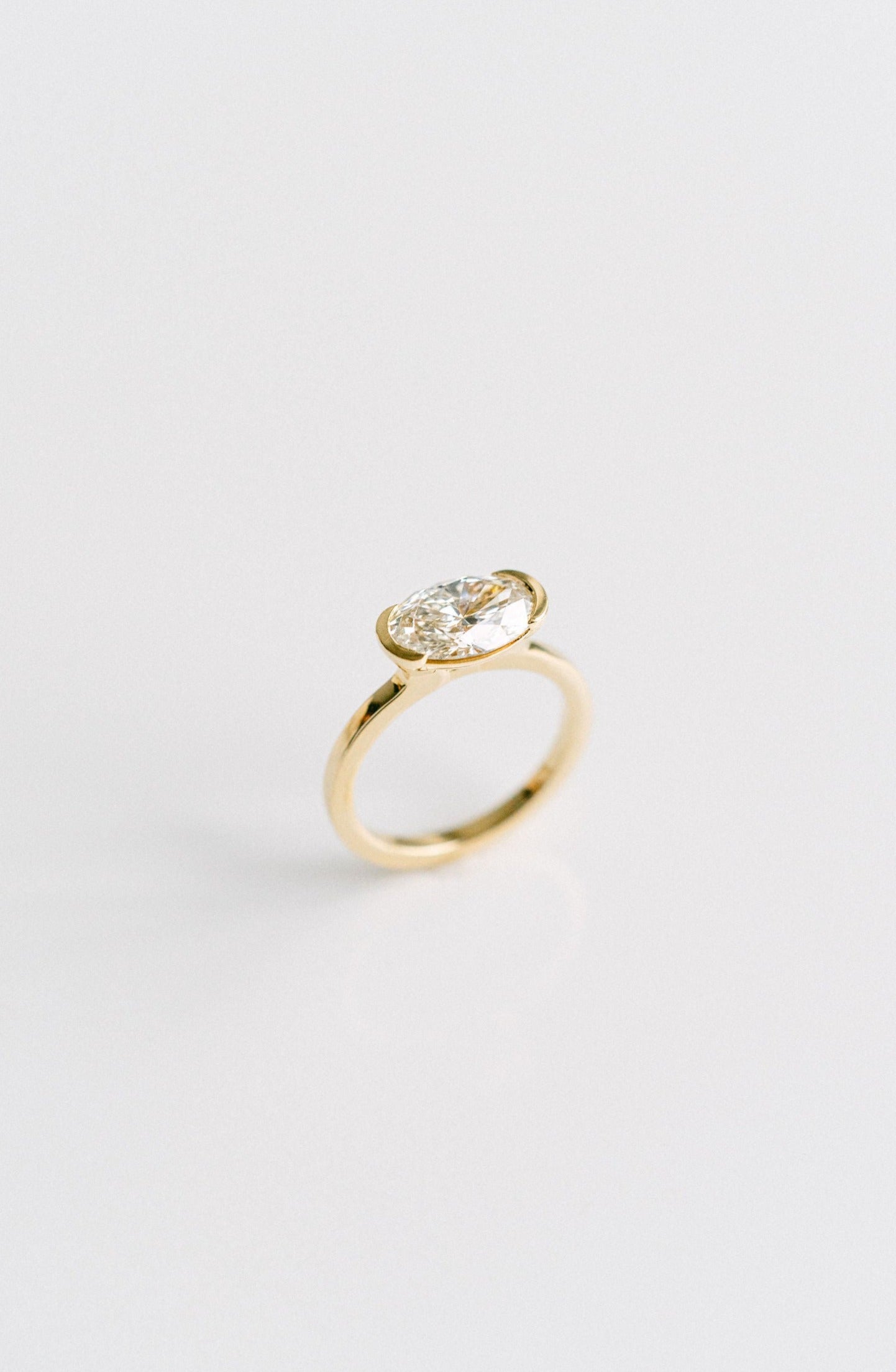 Oval East-West Half Bezel Diamond Engagement Ring, 14k Yellow Gold