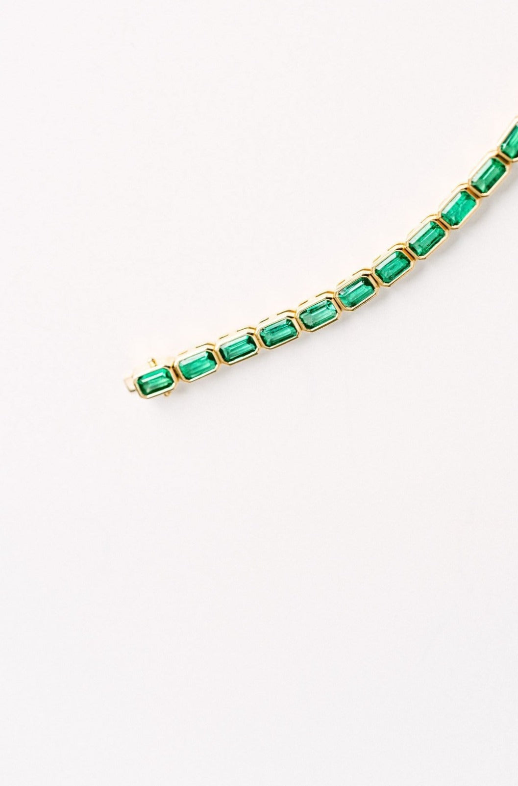 7.50ctw Emerald Cut Colombian Emerald Bezel Tennis Bracelet, 14k Yellow Gold