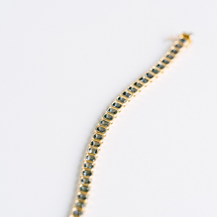 Emerald Cut Blue-Green Sapphire Bezel Tennis Bracelet