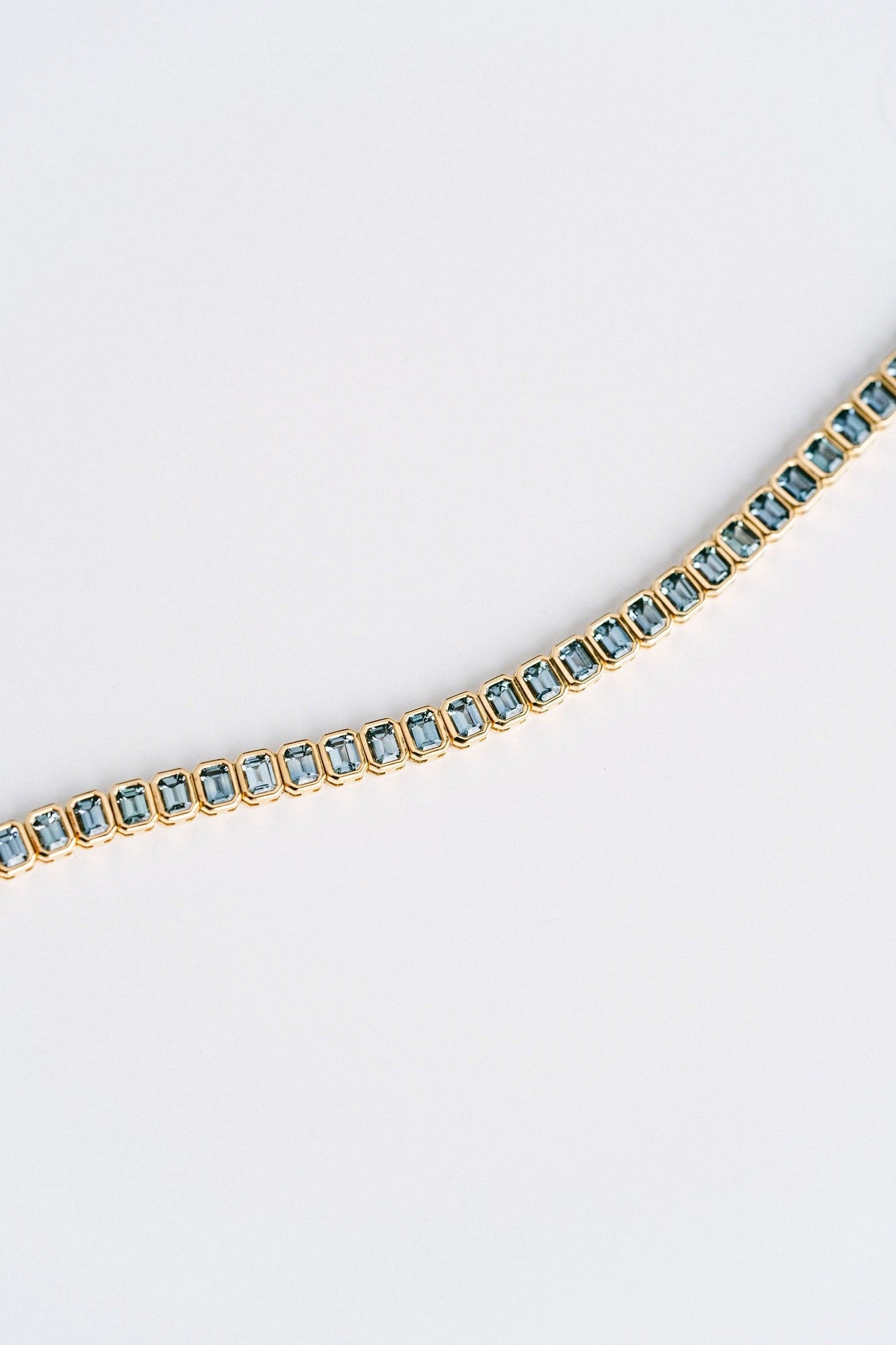 9.21ctw. Emerald Cut Blue-Green Sri Lankan Sapphire Bezel Tennis Bracelet, 14k Yellow Gold