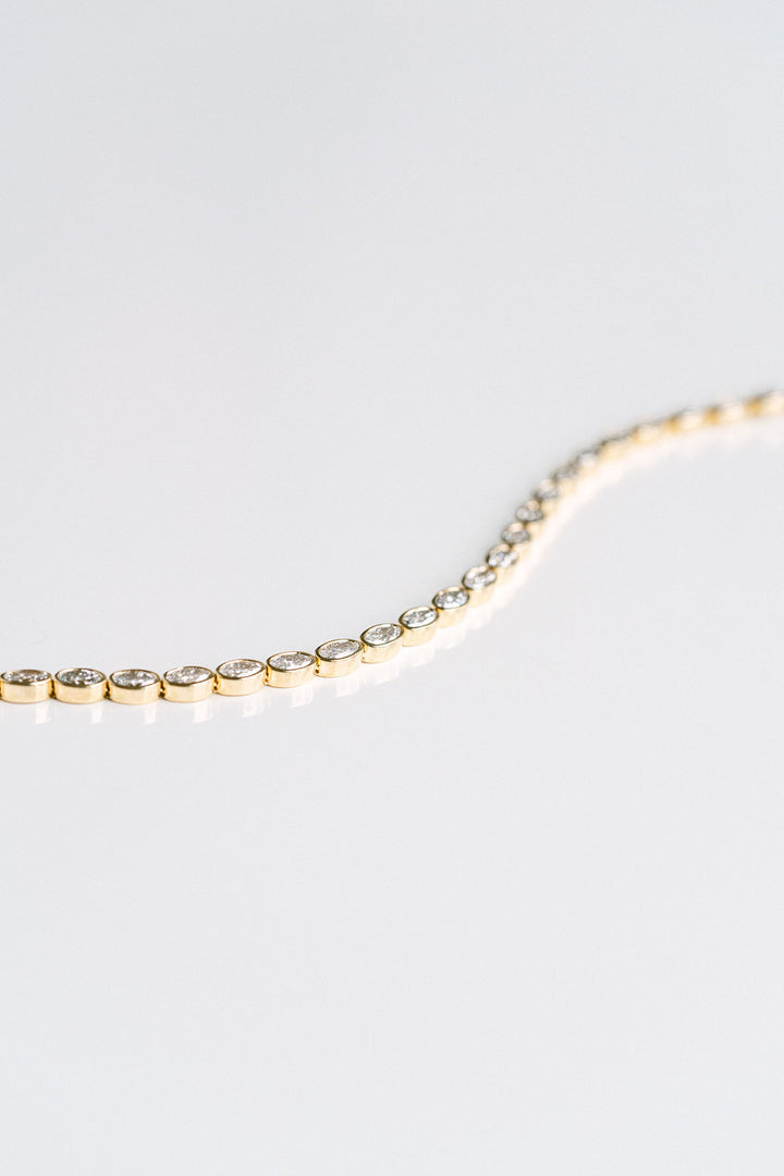 5.36ctw. Oval Lab Diamond Bezel Tennis Bracelet, 14k Yellow Gold