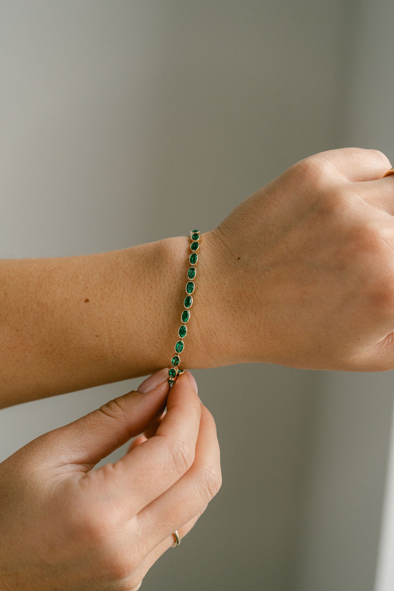 Oval Colombian Emerald Bezel Tennis Bracelet, 14k Yellow Gold