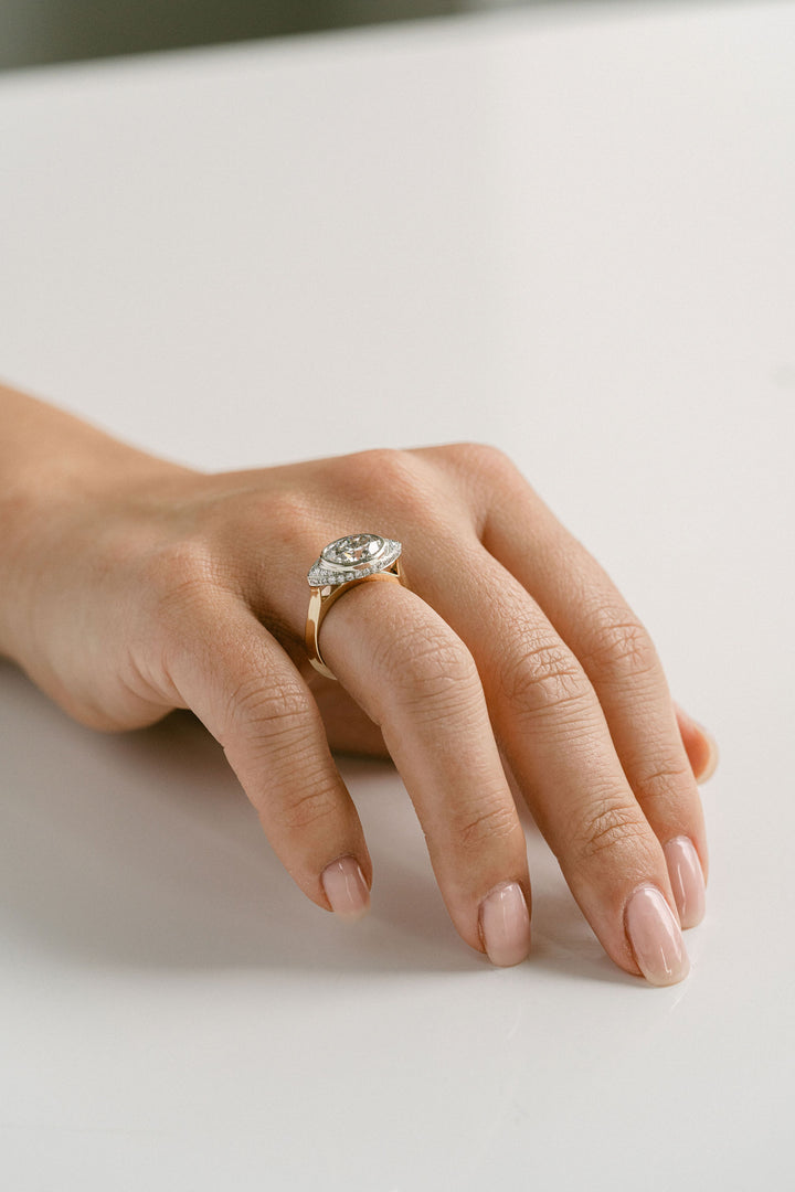 Cavalier Fine Jewelry - Oval Diamond Two Tone Ring With Diamond Eye Halo
