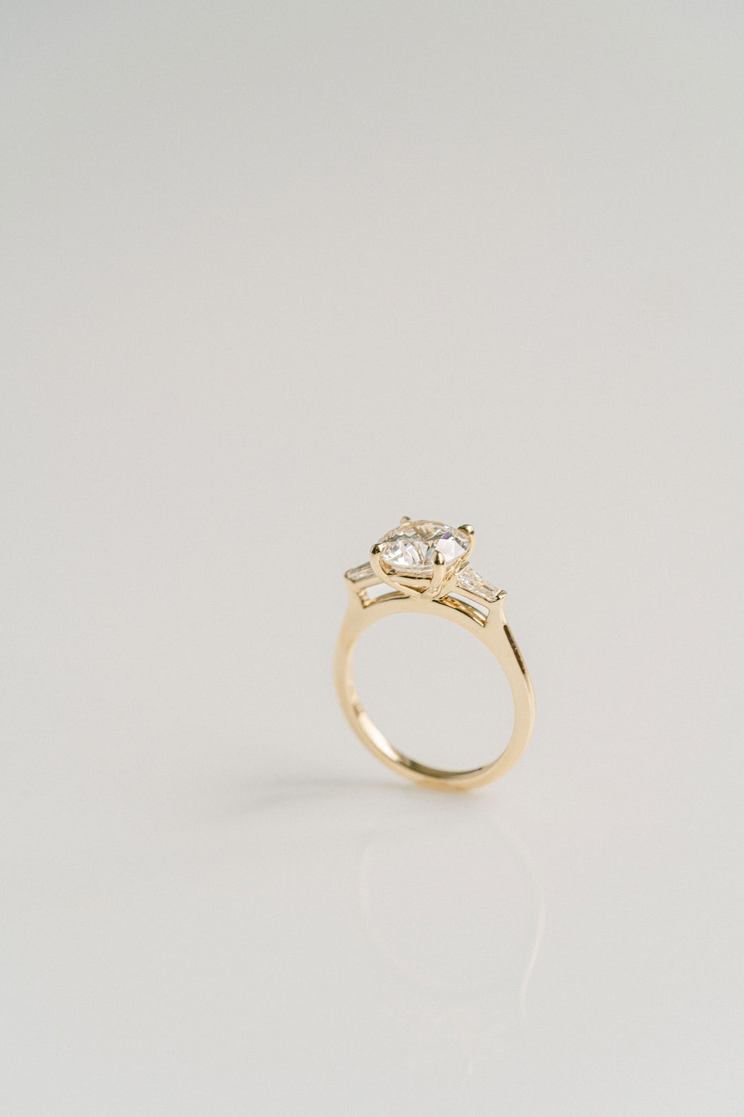 Round Brilliant Diamond Engagement Ring With Tapered Baguette Accents, 14k Yellow Gold