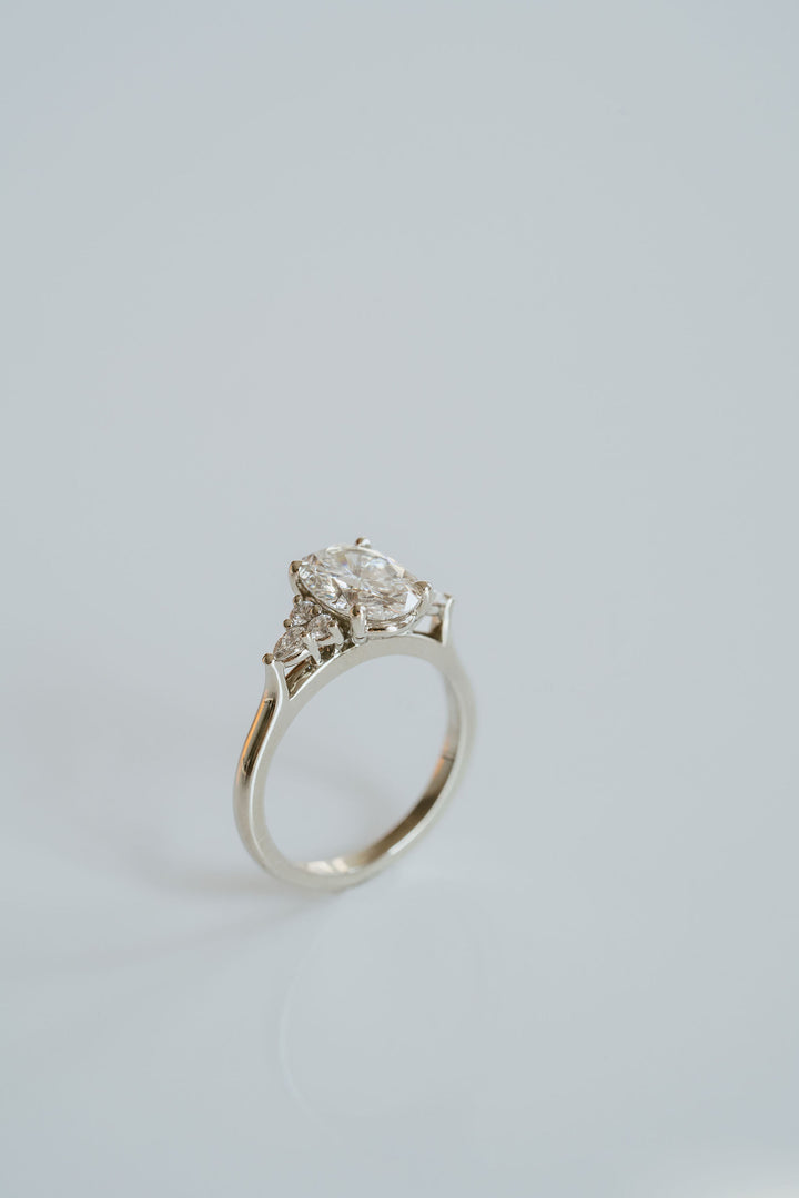 Oval Diamond With Diamond Cluster Accents