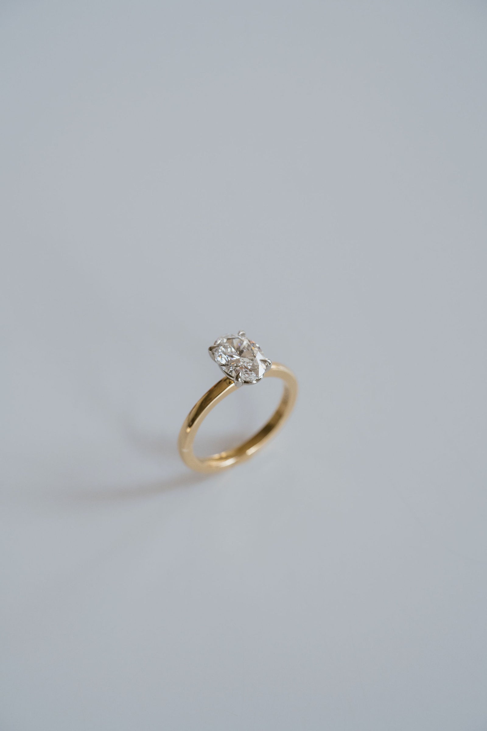 Oval Diamond Two Tone Cavalier Solitaire