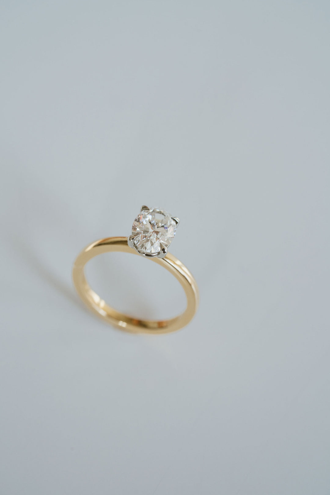 Oval Diamond Two Tone Cavalier Solitaire