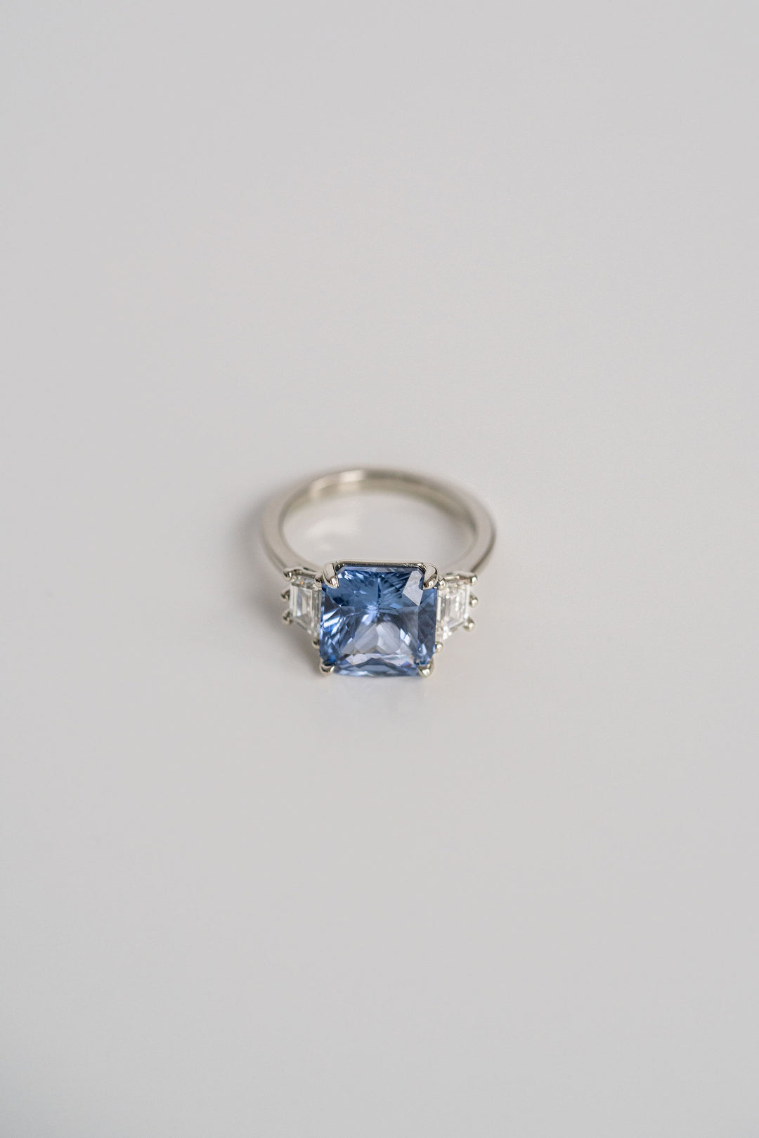 6.20ct Radiant Cut Blue Sri Lankan Sapphire With Trapezoid Diamond Accents, 14k White Gold