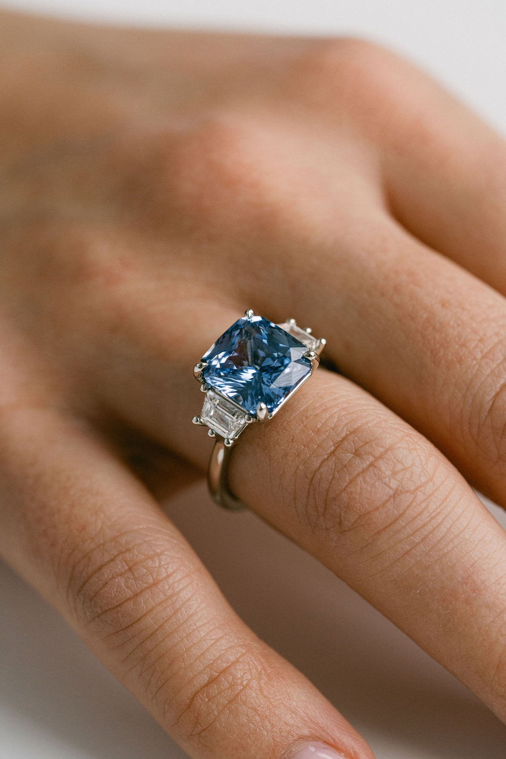 6.20ct Radiant Cut Blue Sri Lankan Sapphire With Trapezoid Diamond Accents, 14k White Gold