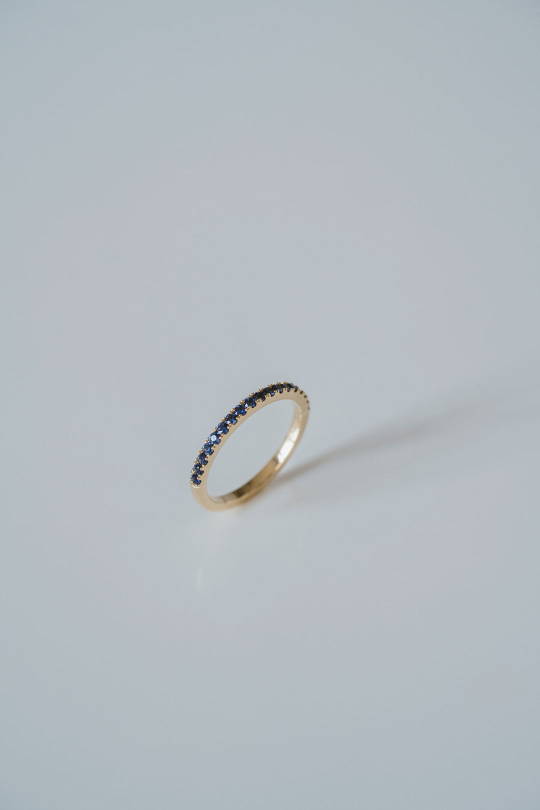 Round Blue Sapphire Pavé Band