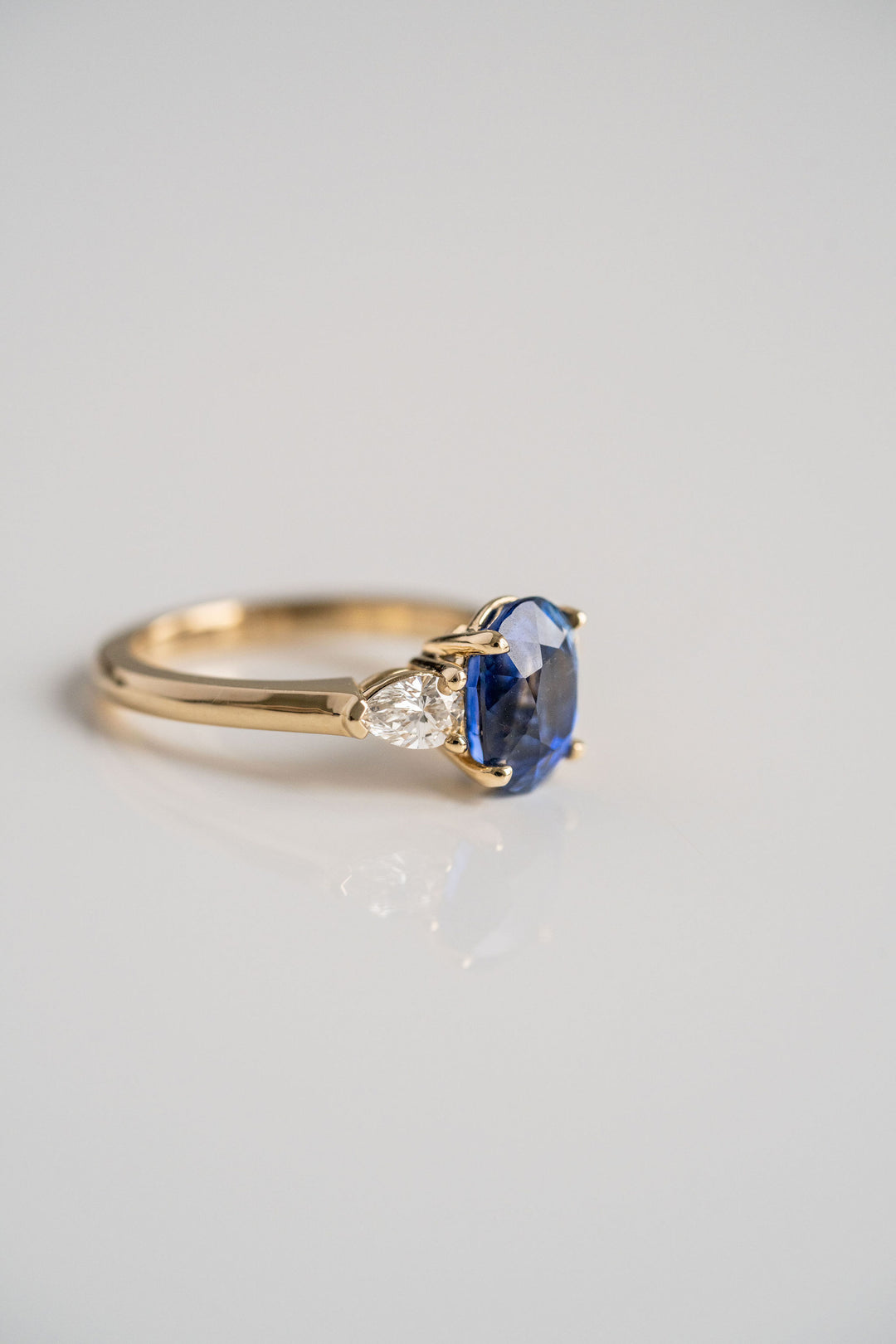 3.24ct. Oval Blue Sri Lankan Sapphire Engagement Ring With Pear Shape Diamond Accents, 14k Yellow Gold