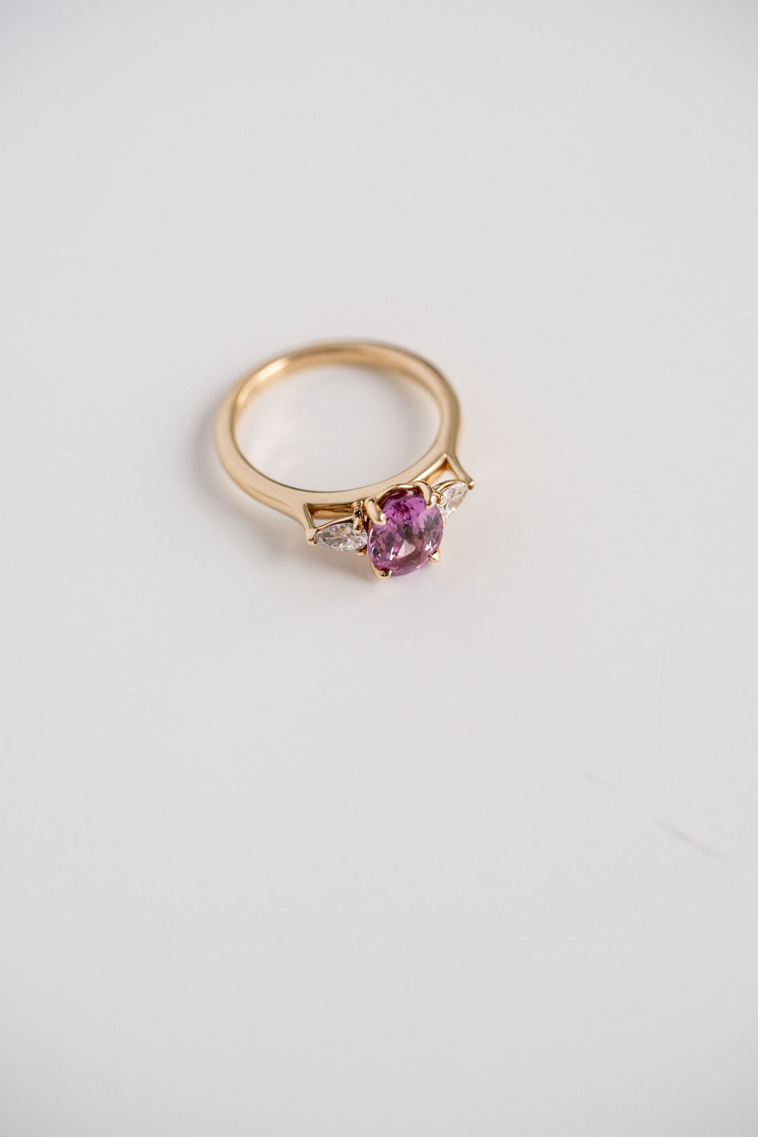 2.18ct. Vivid Pink Oval Sri Lankan Sapphire With Pear Shape Diamond Accents, 14k Yellow Gold