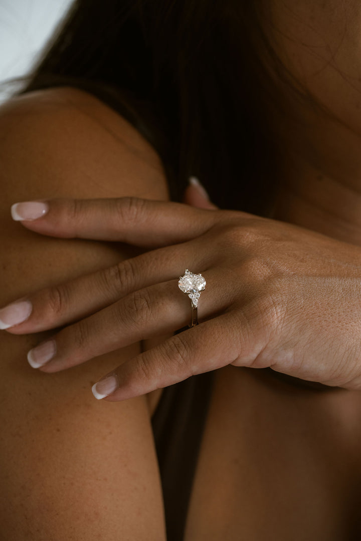 Oval Diamond With Diamond Cluster Accents