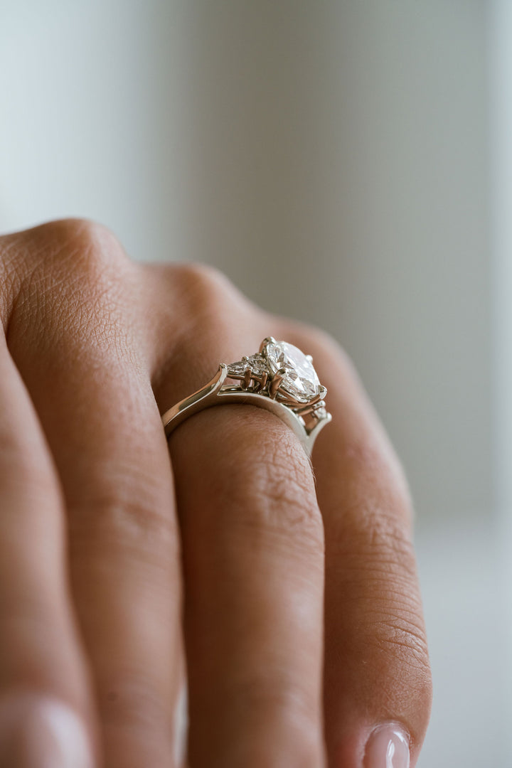 Oval Diamond With Diamond Cluster Accents