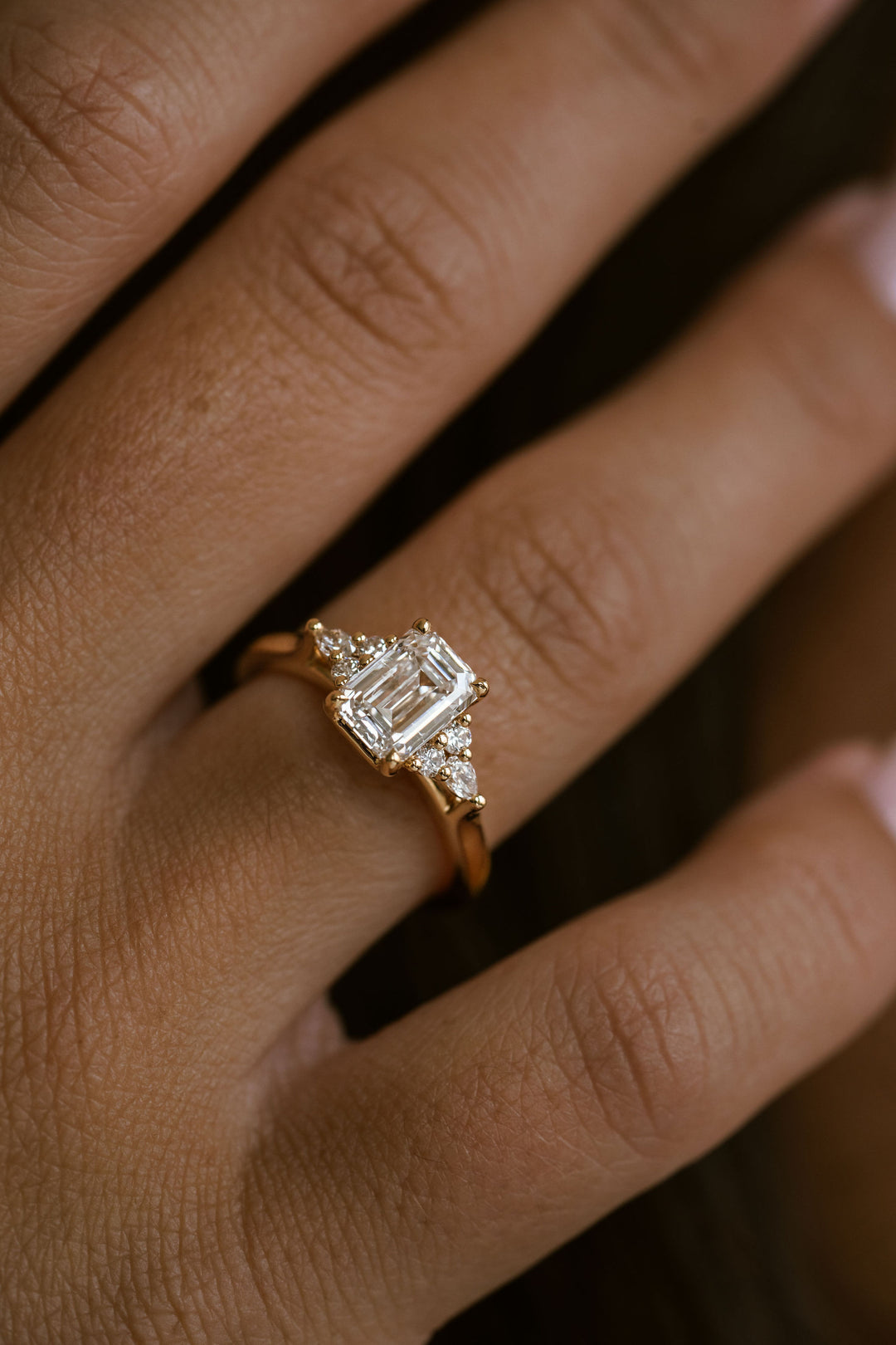 Emerald Cut Diamond With Diamond Cluster Accents