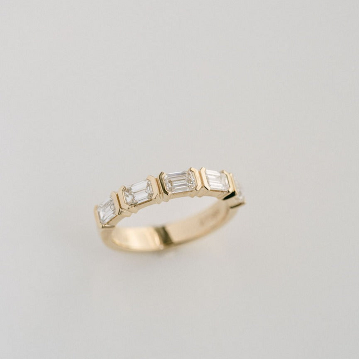 Emerald Cut Diamond East-West Half Bezel Band