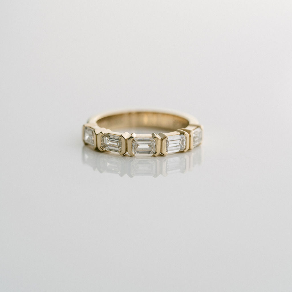 Emerald Cut Diamond East-West Half Bezel Band