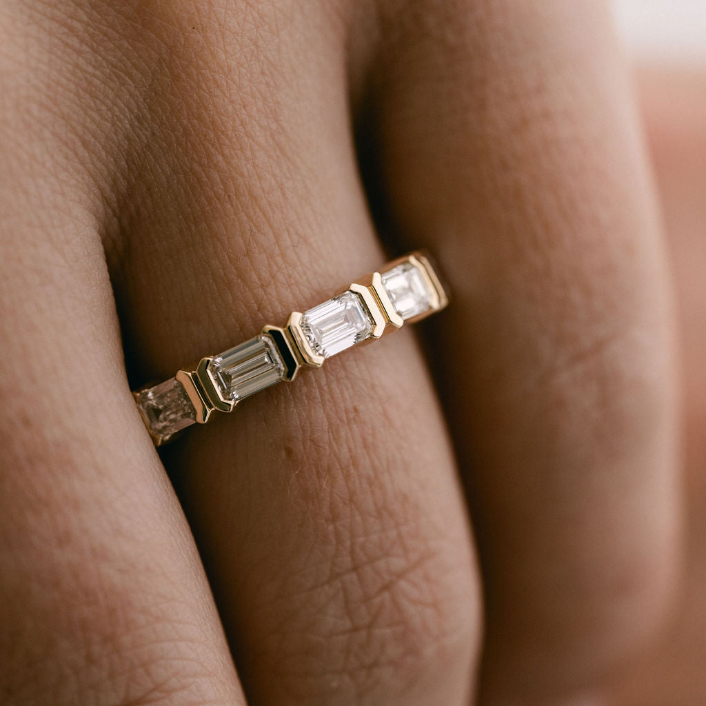 Emerald Cut Diamond East-West Half Bezel Band