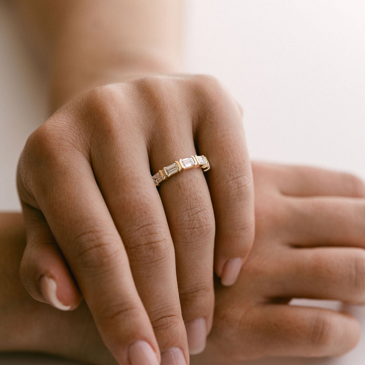 Emerald Cut Diamond East-West Half Bezel Band