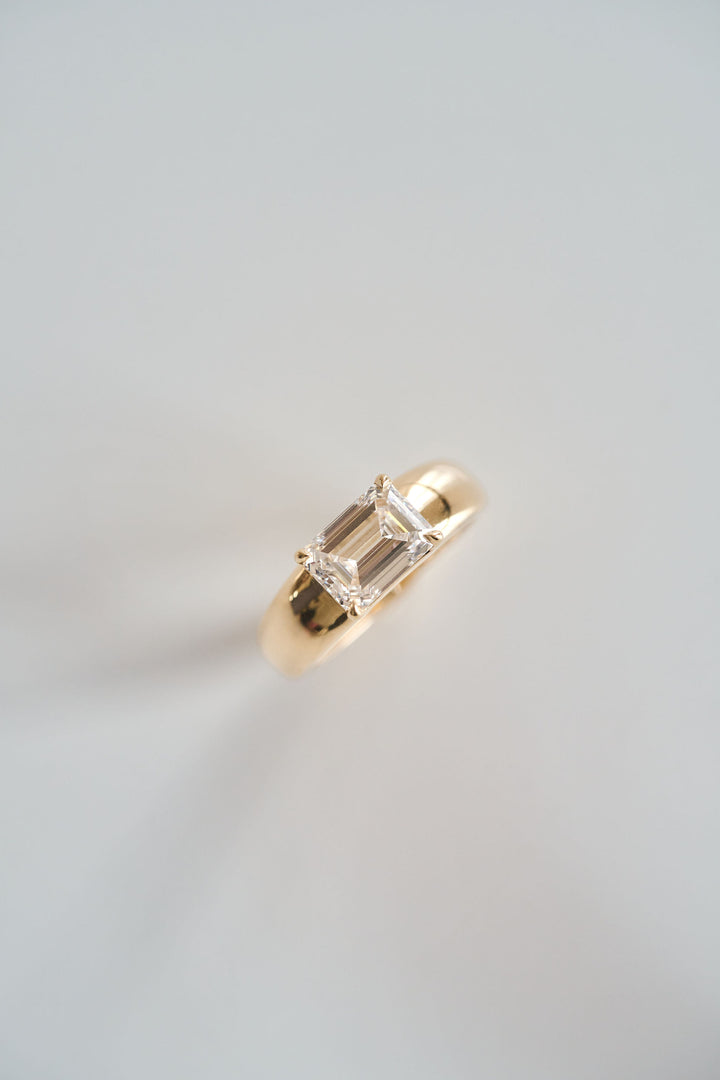 Low Set Emerald Cut Arc Ring