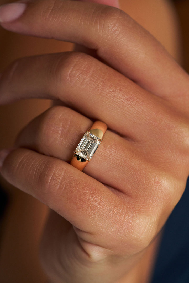 Low Set Emerald Cut Arc Ring
