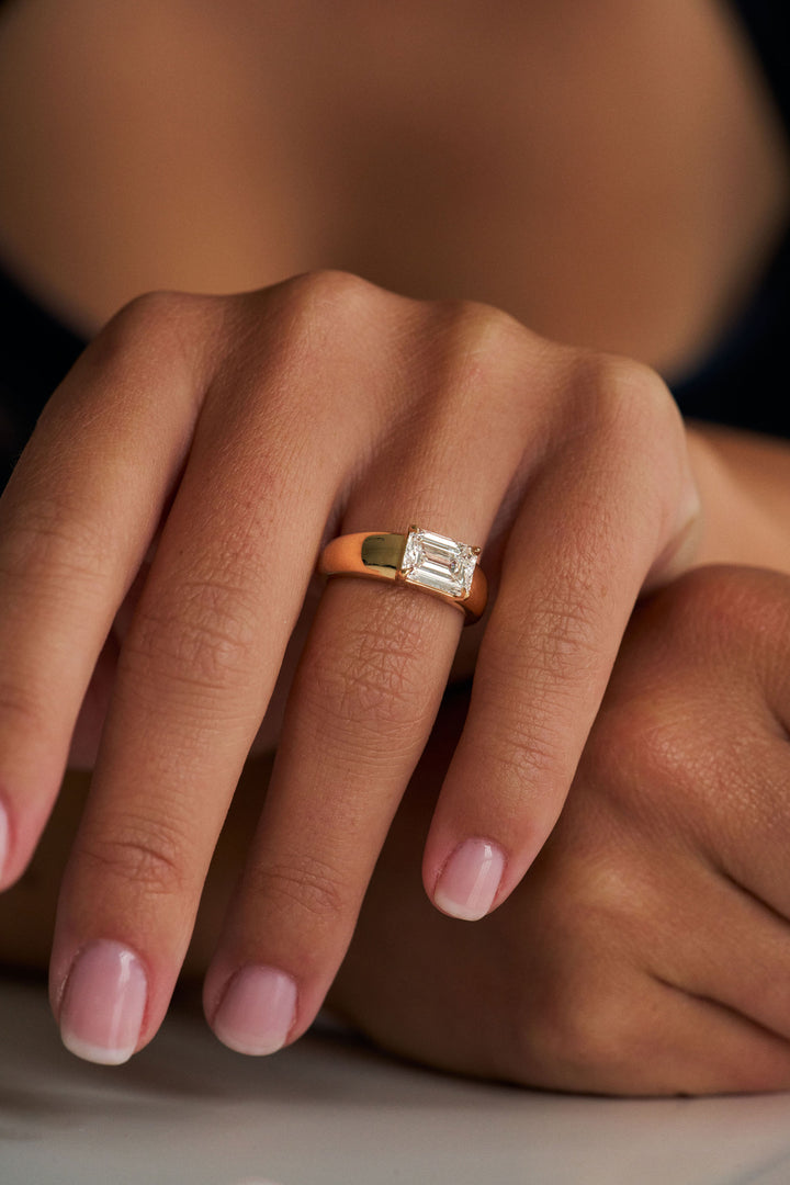 Low Set Emerald Cut Arc Ring