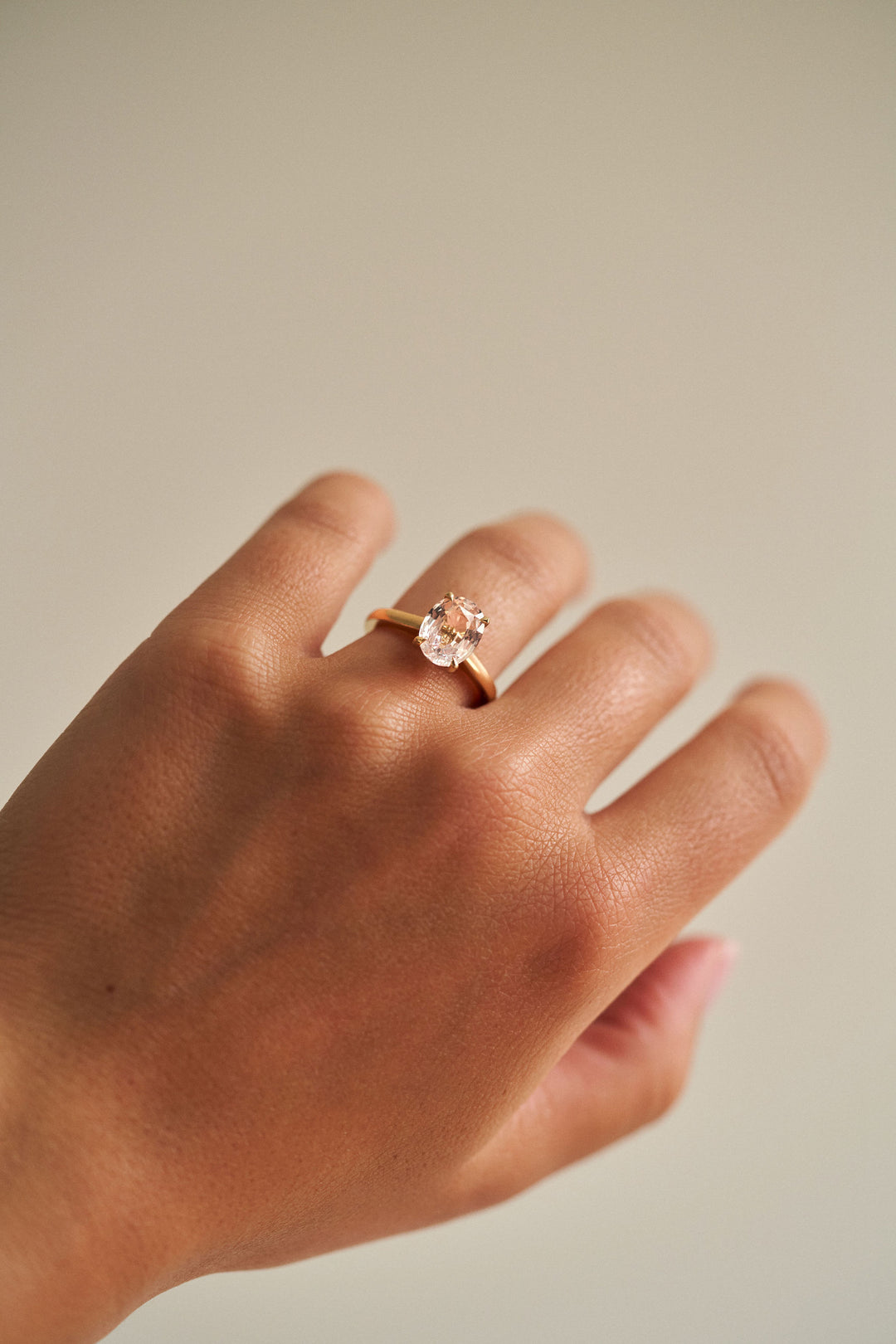 Oval Light Pink/Peach Sapphire Dominion With Diamond Collar