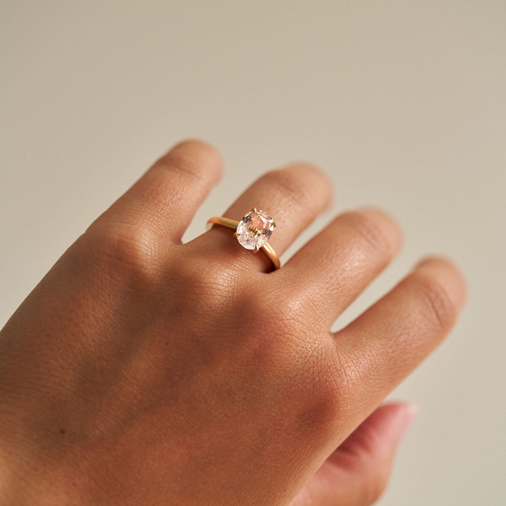 Oval Light Pink/Peach Sapphire Dominion With Diamond Collar