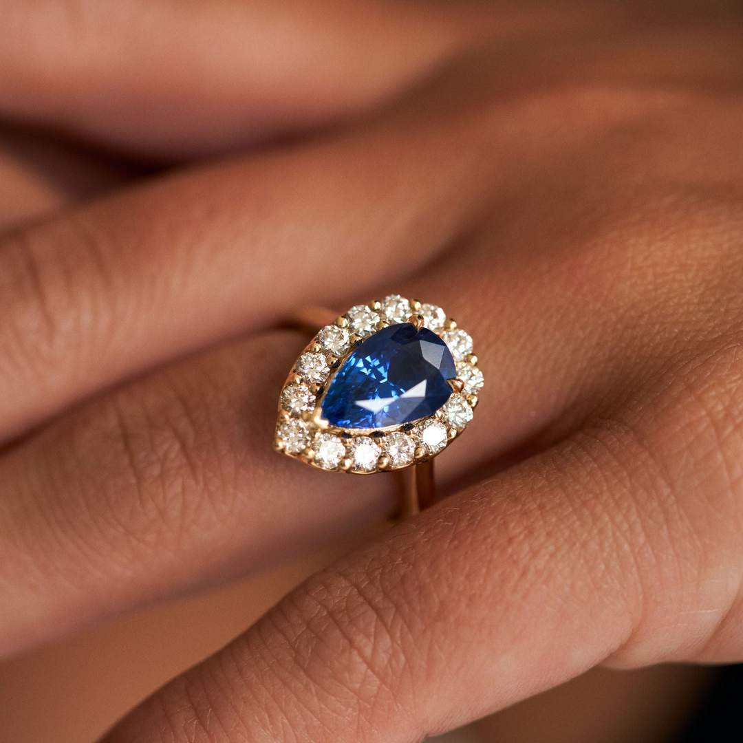 Pear Shape Blue Sapphire with Scalloped Diamond Halo