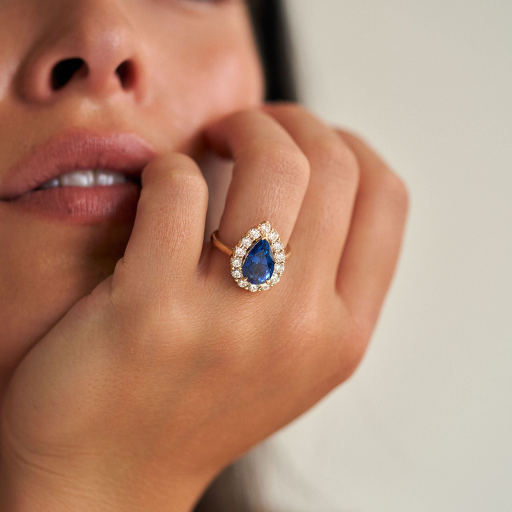 Pear Shape Blue Sapphire with Scalloped Diamond Halo